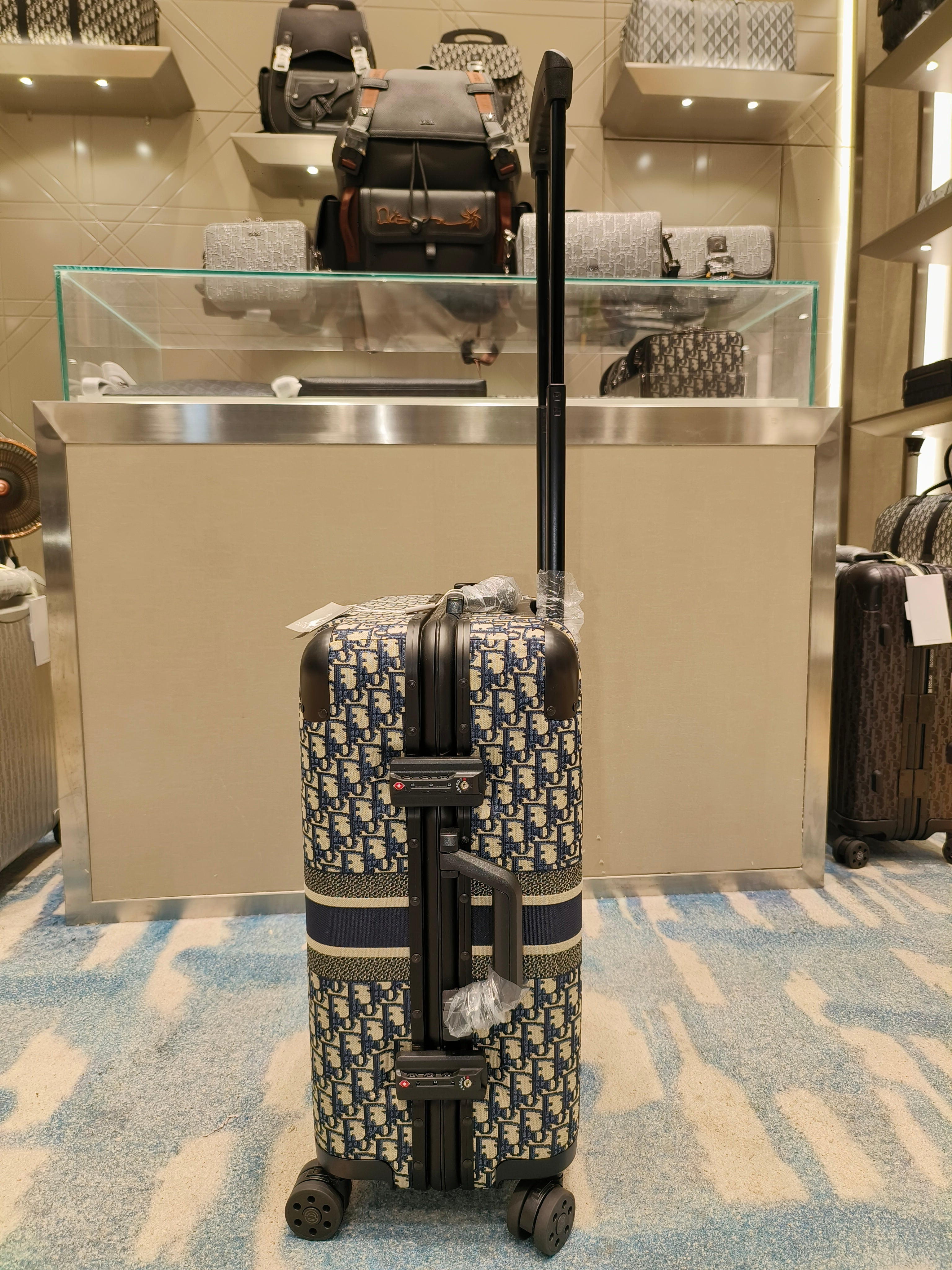 Black, Silver and Brown Suitcase